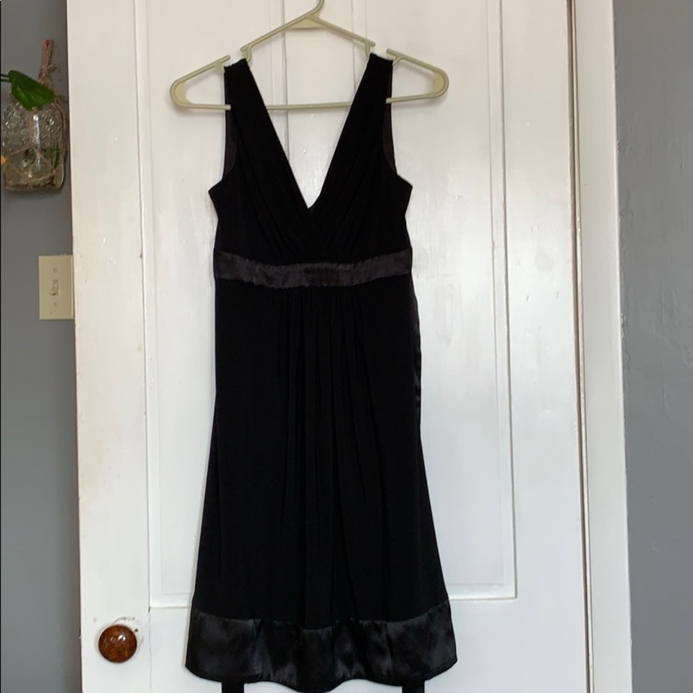 Little black party dress with plunge neckline